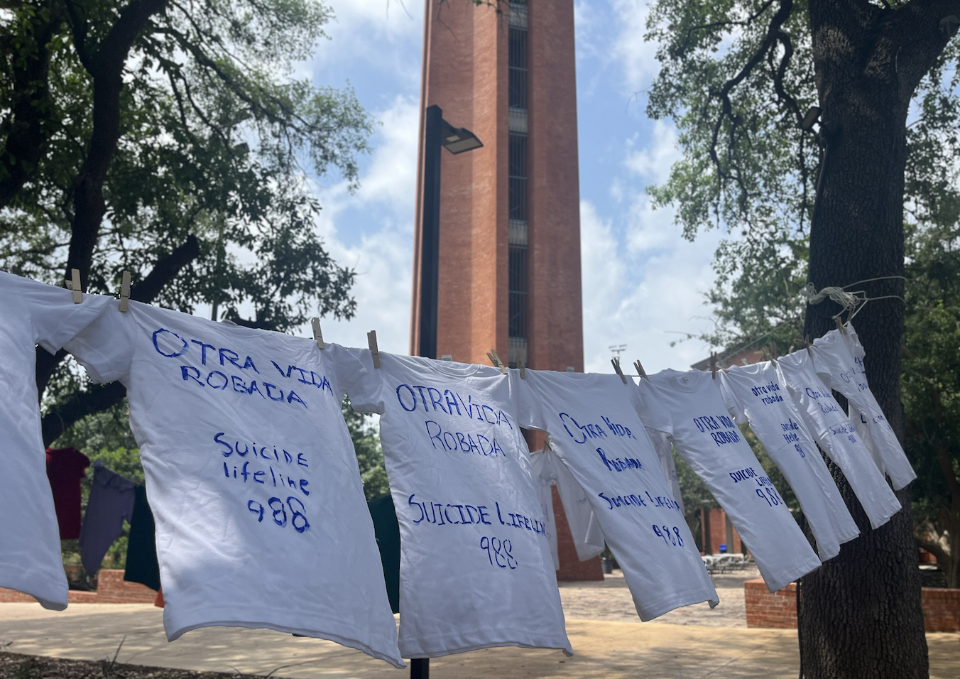 Shirts memorializing suicide victims in front of Trinity Tower